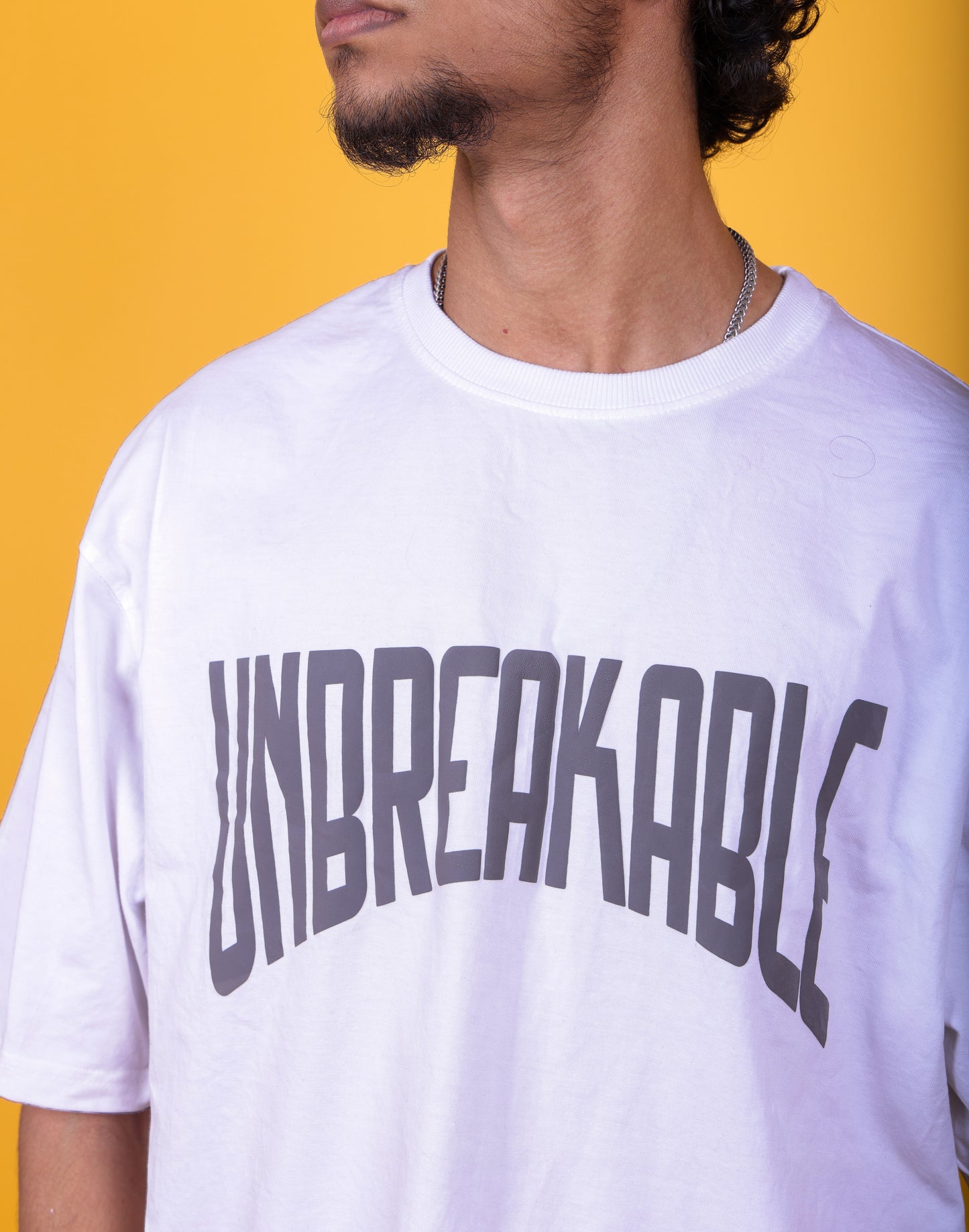 UNBREAKABLE TYPO PUFF PRINT OVERSIZED TSHIRT