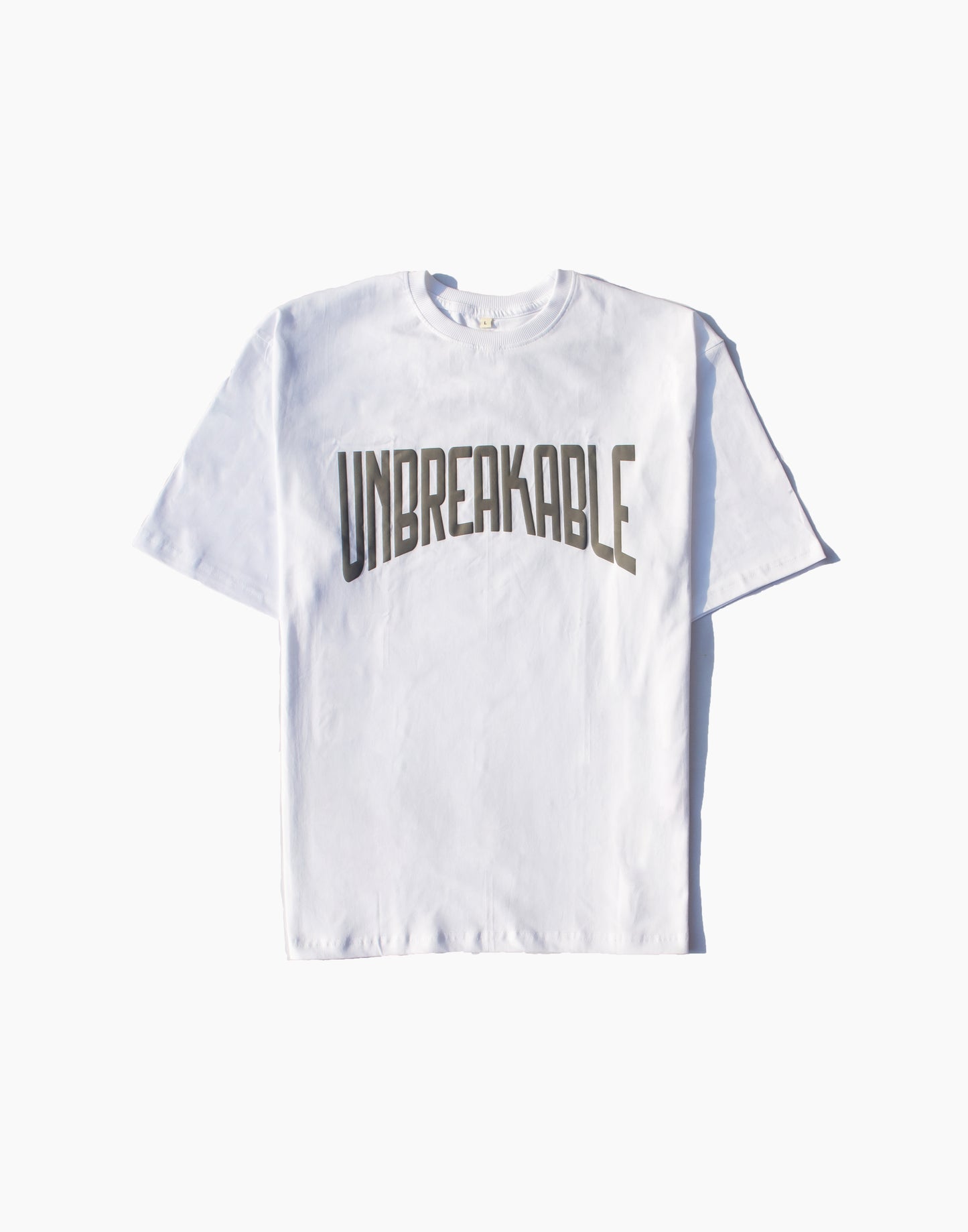 UNBREAKABLE TYPO PUFF PRINT OVERSIZED TSHIRT